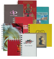 a colorful assortment of custom prayer and retreat journals